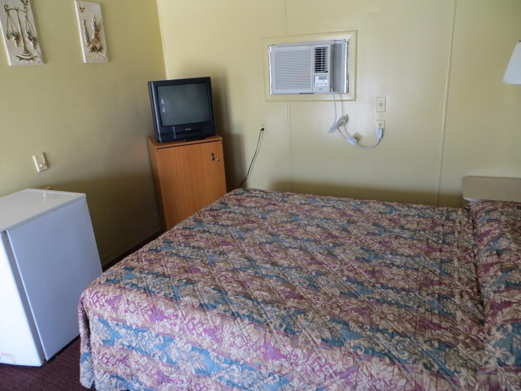 Travelers Inn Okeechobee Rum bild