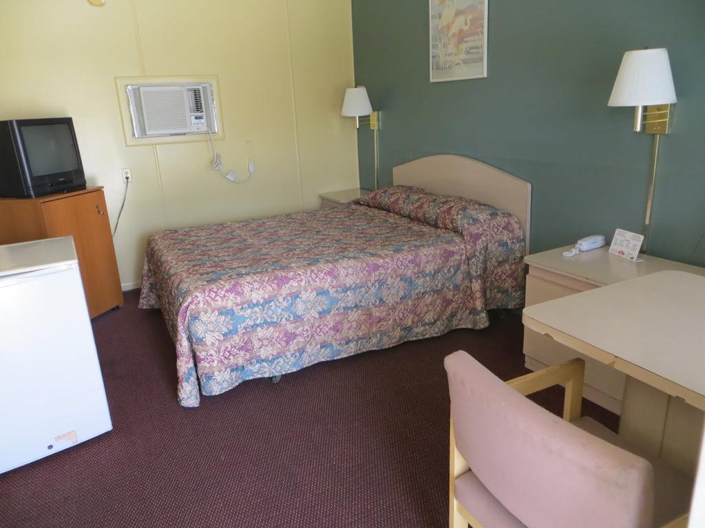 Travelers Inn Okeechobee Rum bild